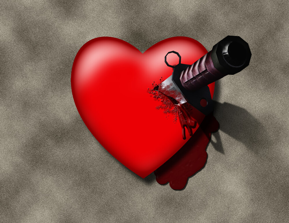 Cartoon of a beautiful 3-D red heart, with a serious knife imbedded.