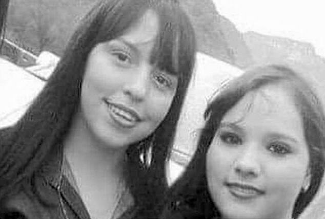 Black and
white selfie of two young women, posing while standing on a
municipal airstrip.